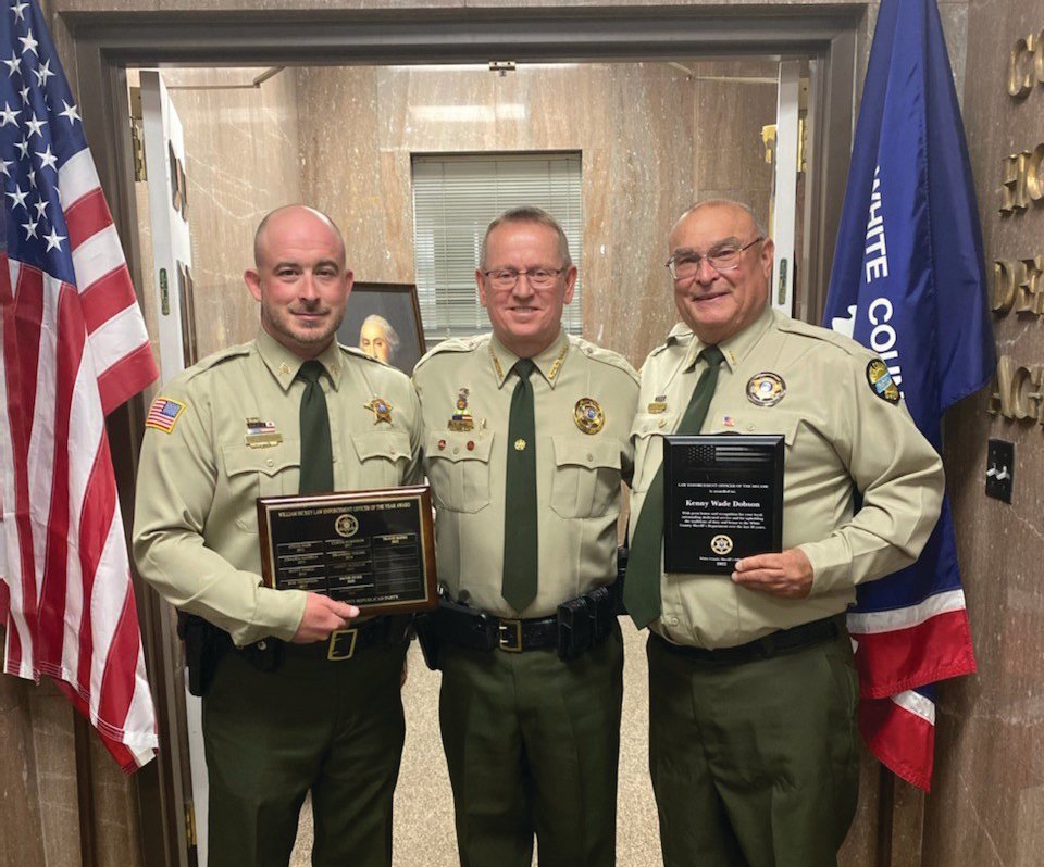 L-R: Travis Bates, Deputy of the Year Award recipient, White County Sheriff Steve Page, and Kenny Dobson, Deputy of the Decade Award recipient